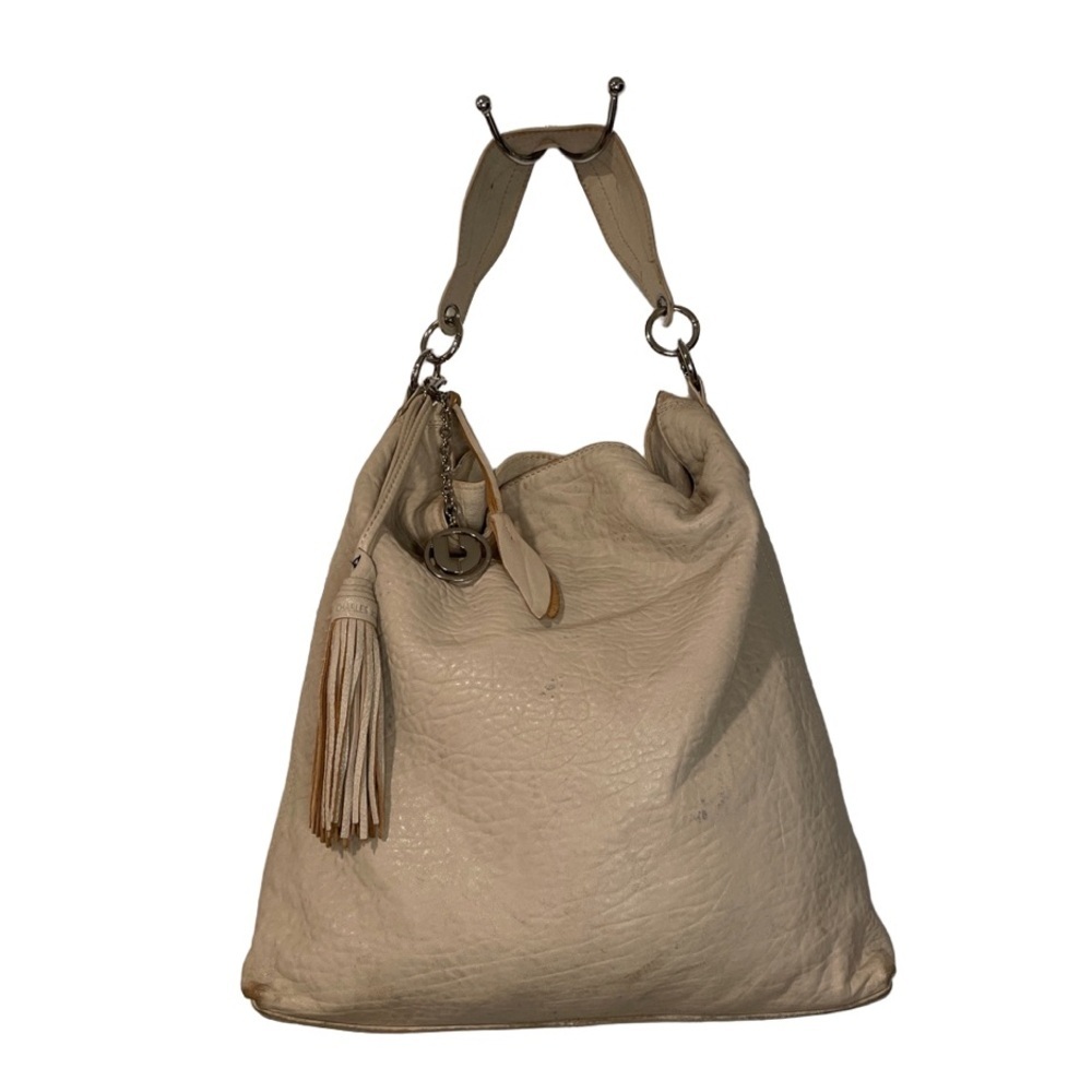 Charles Jourdan off white leather bag with 2 silver charms. B6